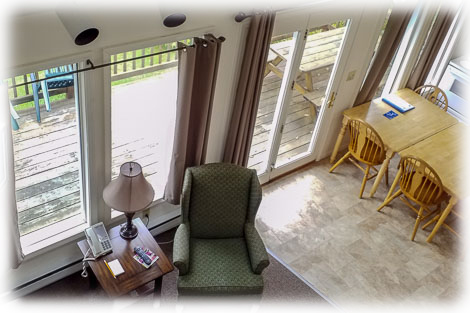 View of living area from lofted bedroom